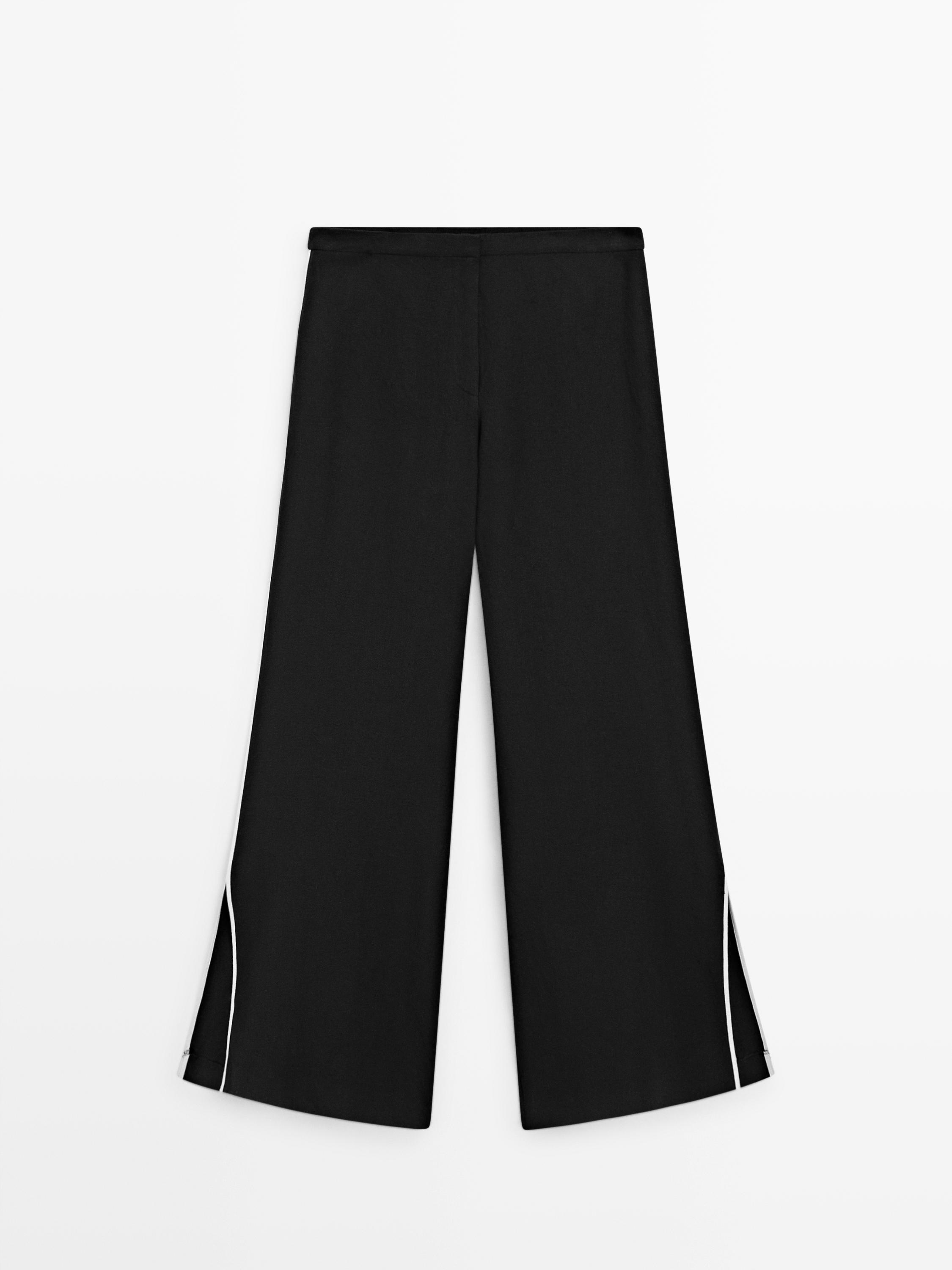 Linen trousers with contrast trim
